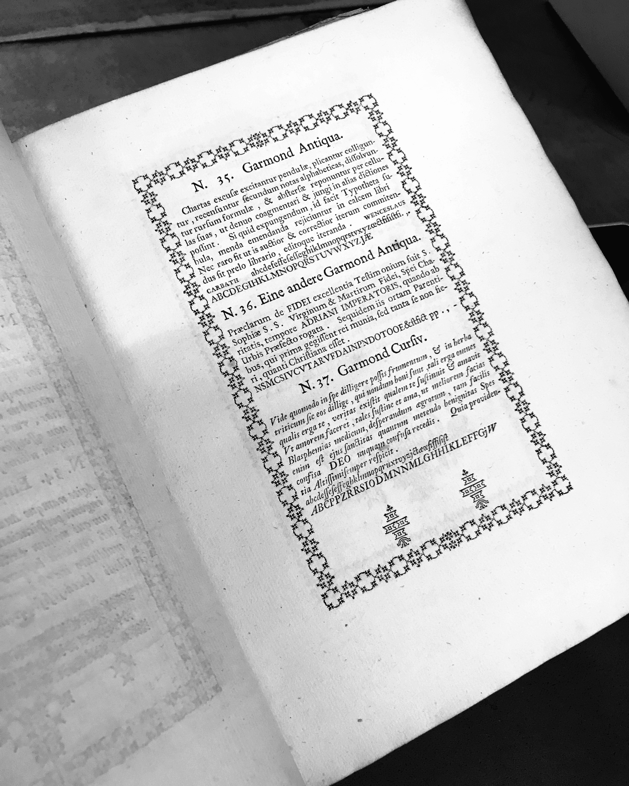 A page showing impressions of type in the Garmond size. At first glance, the romans appear very similar, but they are two entirely different typefaces, most easily distinguished by certain capital letters.